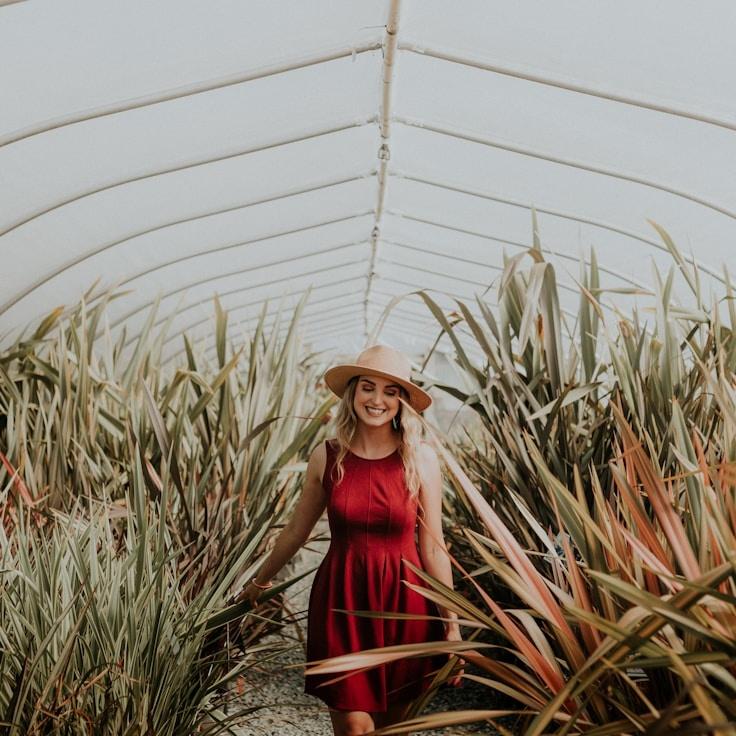Kaveri Mehta, Lead Design Curator at Spruce Field Morn, reviewing corporate floral arrangements